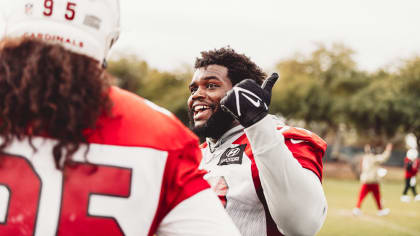 Arizona Cardinals defensive tackle Leki Fotu (95) warms up before