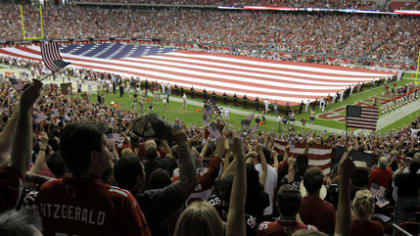 Fans remember Cardinals great in home opener