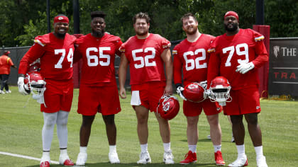 Kansas City Chiefs guard Trey Smith (65) blocks against the Las