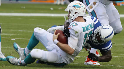 Miami Dolphins quarterback Ryan Tannehill drops back to pass against the  Indianapolis Colts in the second