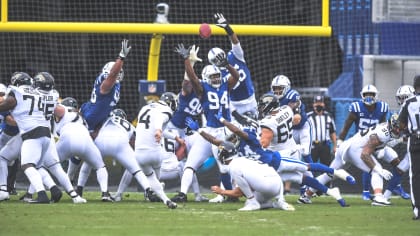 Jaguars charge back in fourth quarter to beat Colts for first win of season