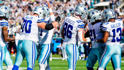 Cowboys defeat 'blue jersey curse' with playoff victory over