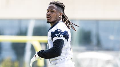 Safety (28) Malik Hooker of the Dallas Cowboys warms up before