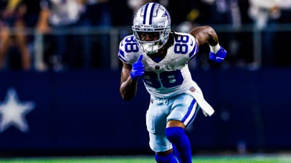 Dallas Cowboys wide receiver CeeDee Lamb (88) stretches the ball over the  goal line for the gam …