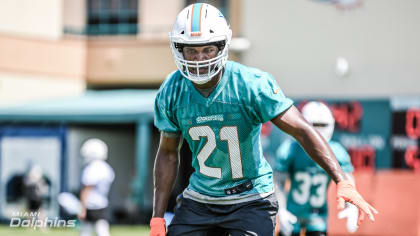 Miami Dolphins cornerbacks Xavien Howard (25) and Eric Rowe (21