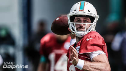 DeVante Parker of the Miami Dolphins runs a drill during practice at