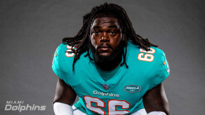 Miami Dolphins guard Solomon Kindley (66) smiles as he walks back to the  locker room at half time during an NFL football game against the  Indianapolis Colts, Sunday, Oct. 3, 2021, in