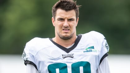 Philadelphia Eagles defensive end Ryan Kerrigan (90) warming up on the  field before the start of the first half of an NFL football game, Sunday,  Jan. 2, 2022, in Landover, Md. (AP