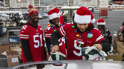 Miami Dolphins spread holiday cheer to troops in Jordan