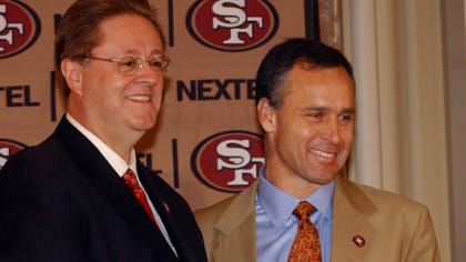 49ers 441 mac.jpg Former 49er head coaches Bill Walsh, left and