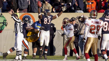 Chicago Bears linebackers Brian Urlacher (54) and Lance Briggs (55) stand  on the field during the first quarter against the Green Bay Packers at  Soldier Field on December 22, 2008 in Chicago.