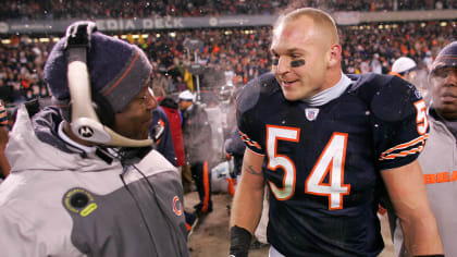 Chicago Bears' Brian Urlacher smiles as he watches his teammates during the  NFL football team's training camp at Olivet Nazarene University in  Bourbonnais, Ill., Friday, July 30, 2010.(AP Photo/Nam Y. Huh Stock