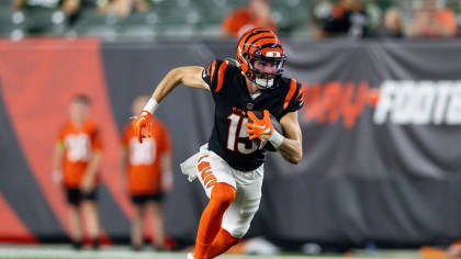 Cincinnati Bengals quarterback Jake Browning finds tight end Thaddeus Moss  open down the sideline for 17-yard grab