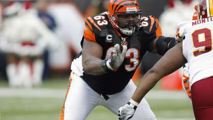 Cincinnati Bengals running back Rudi Johnson (L) fumbles the ball