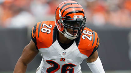 Cincinnati Bengals safety Taylor Mays talks to a teammate during