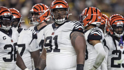 Cincinnati Bengals defensive end Josh Tupou (68) runs off the field after  an NFL football game against the New York Jets, Sunday, Oct. 31, 2021, in  East Rutherford, N.J. (AP Photo/Adam Hunger