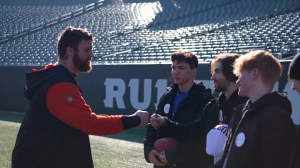 C.J. Uzomah shows up to the game in an Elf costume