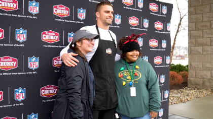 C.J. Uzomah shows up to the game in an Elf costume