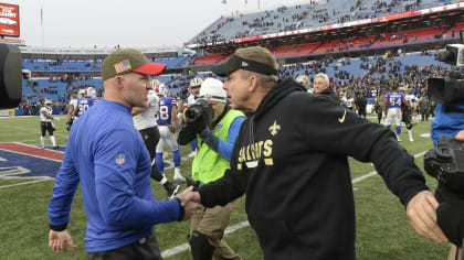 Buffalo Bills offensive coordinator Ken Dorsey, left, talks with  quarterback Josh Allen (17) before an NFL preseason football game against  the Indianapolis Colts in Orchard Park, N.Y., Saturday, Aug. 12, 2023. (AP