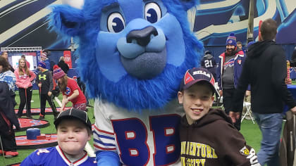 Rory Cavalier (left) and his older brother Owen Cavalier (right) pose with Billy Buffalo on Sunday, Nov. 27th.