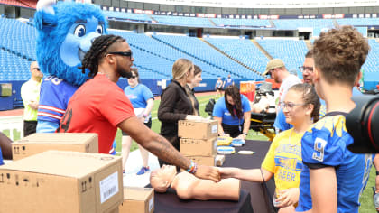 Damar Hamlin's condition shows improvement, Buffalo Bills say - BBC News