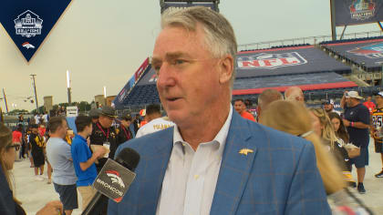 Joe Ellis, president of the Denver Broncos, responds to questions during a  news conference on media day before the team officially opens an NFL  football training camp at Broncos headquarters Tuesday, July