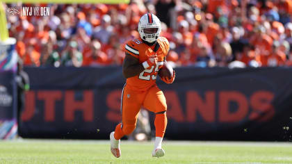 Denver Broncos running back Samaje Perine (25) runs against the