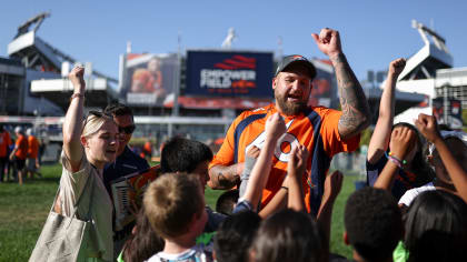 Fans at Invesco Field at Mile High both boo and cheer new Chicago