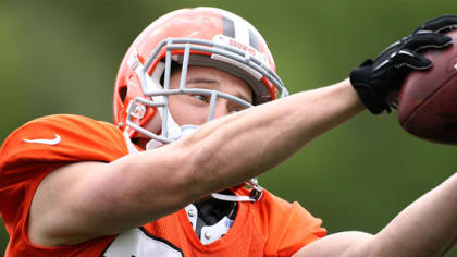 Miami Dolphins orange practice jersey's make their way on the field