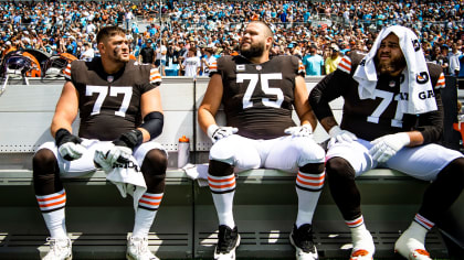 Jedrick Wills Jr. #71 of the Cleveland Browns walks to the bench