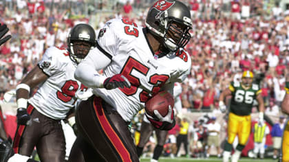 Tampa Bay Buccaneers' tight end Dave Moore looks at ba replay between plays  during a game against the New York Jets at Raymond James Stadium in Tampa,  Florida on August 11, 2006.