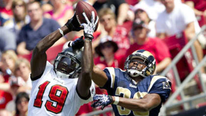 St. Louis Rams Brandon Gibson tries to elude the San Francisco