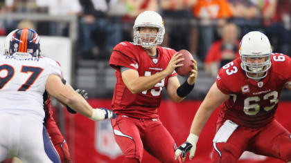 The communications equipment in the helmets of Arizona Cardinals  quarterback Trace McSorley (19) and linebacker Zaven Collins (25) is tested  before a preseason NFL football game between the Cardinals and the Tennessee