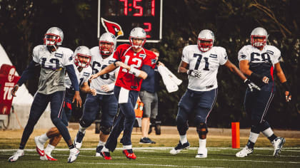 New England Patriots quarterback Tom Brady walks off the field at halftime  but hasn't had a great game against the Arizona Cardinals. The Pats  defeated the Cardinals 23-12 September 19, 2004 in