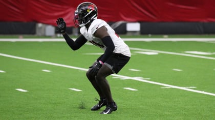 Arizona Cardinals running back Corey Clement (23) handles the ball against  Minnesota Vikings cornerback Jaylin Williams (38) during the second half of  an NFL preseason football game Saturday, Aug. 26, 2023 in