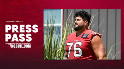 Arizona Cardinals guard Will Hernandez (76) wears a Mexico flag