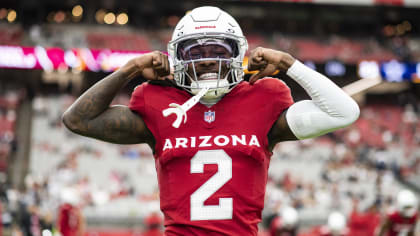 Ken Griffey Jr. Is a photographer at the Arizona Cardinals game