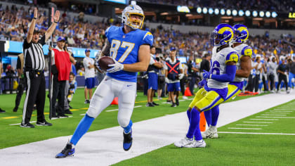 Los Angeles Chargers tight end Hunter Kampmoyer (87) celebrates his  two-point conversion with running back Isaiah Spiller (28) during the  second half of a preseason NFL football game against the Los Angeles Rams  Saturday, Aug. 13, 2022, in Inglewood