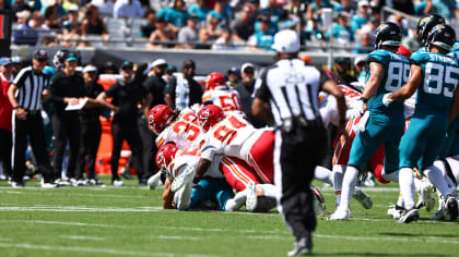 Kansas City Chiefs defensive end George Karlaftis overpowers two