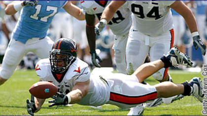 Patrick Kerney of the Atlanta Falcons stands on the field during