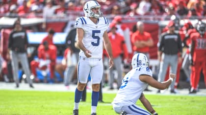 Indianapolis Colts guard Danny Pinter (63) points to the defense before the  snap during an NFL football game against the New England Patriots,  Saturday, Dec. 18, 2021, in Indianapolis. (AP Photo/Zach Bolinger