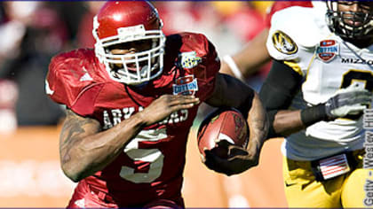 Oakland Raiders running back Darren McFadden (20) rushes down the