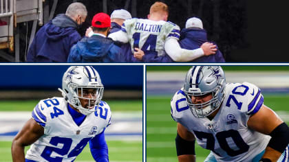 Landover, United States. 25th Oct, 2020. Dallas Cowboys quarterback Andy  Dalton (14) evades Washington Football Team linebacker Cole Holcomb (55)  during the first half of an NFL football game at FedEx Field