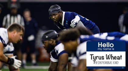 Dallas Cowboys wide receiver Tyron Johnson, left, can't hold on to a pass  while under pressure from cornerback Eric Scott Jr. during the NFL football  team's training camp Monday, July 31, 2023