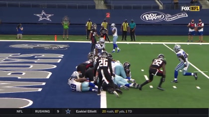 Dallas Cowboys quarterback Dak Prescott hits a wide-open Cowboys running  back Ezekiel Elliott for a walk-in touchdown pass