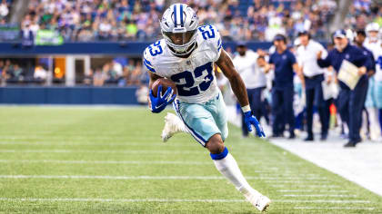 Dallas Cowboys running back Rico Dowdle (23) fumbles the ball