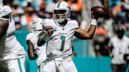 Miami Dolphins tight end Mike Gesicki (88) deflects the ball as