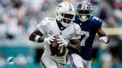 Cleveland Browns running back Nick Chubb (24) and Miami Dolphins wide  receiver Tyreek Hill (10) exchange jerseys at the end of an NFL football  game, Sunday, Nov. 13, 2022, in Miami Gardens