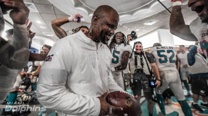 Miami Dolphins' Brian Flores gets a Gatorade shower, a game ball and a  victory he dedicates to his late mom