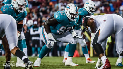 Miami Dolphins guard Michael Deiter (63) heads onto the field for warmups  before the start of a NFL preseason football game against the Las Vegas  Raiders, Saturday, Aug. 20, 2022, in Miami